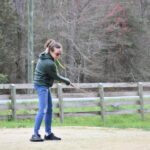 women-hitting-in-sand