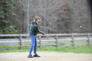 women-hitting-in-sand