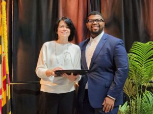 James Jones of Delmarva Power presents the Non-Profit of the Year Award to JoAnn Blackmon, Epoch Dream Center (1)