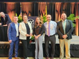 Maryland Stadium Authority Executive Director Lindsey Parker and Assistant Vice President Chris Deremeik accepted the Wicomico Tourism Partner of the Year Award
