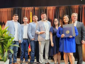 Mike Price and his team accept the New Business of the Year Award, presented by John Hickman, BEACON and Perdue School of Business (1)