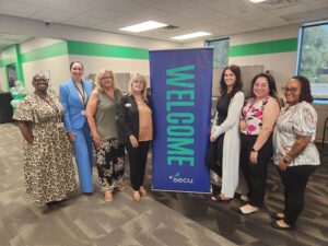 SECU's Cathy Donoway, SECU's Financial Center Manager, and her team celebrate their 75th anniversary of the financial cooperative SECU's Cathy Donoway, SECU's Financial Center Manager, and her team celebrate their 75th anniversary of the financial cooperative