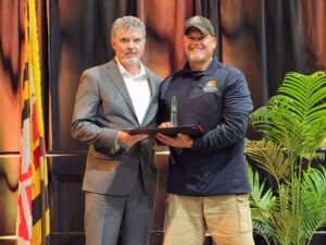 Sponsore Tony Rayne, Seagull Disposal presents Bob Thompson with the Environmental Service Award, for Choptank Electric Cooperative (1)